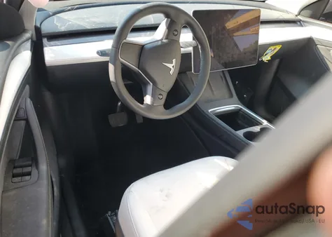 2024 Tesla Model Y from USA, damaged, VIN 7SAYGDED7RF162680